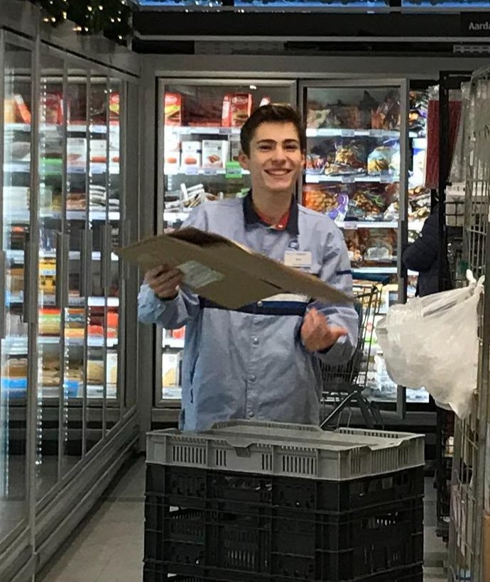 A young Sem Michels working at Albert Heijn supermarket